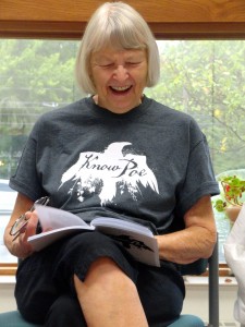 Dee Tarentino laughs during a Know Poe book talk at Mentor Senior Center.