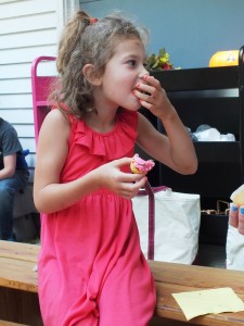 Hazel's dress coincidentally coordinated with her cupcake.