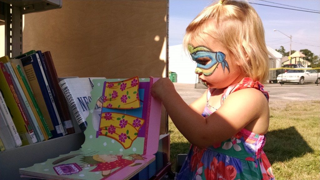 A girl picks through our Pop-Up Library during Concord Community Days. Where do you want our Pop-Up to appear next?