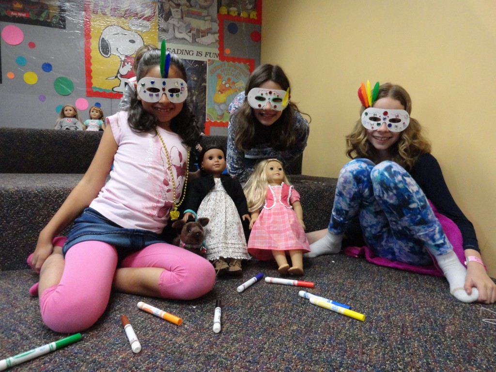 Some of the girls show off their finished masks.
